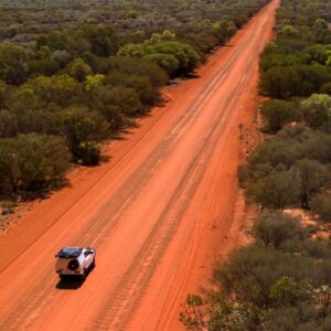 Australia Tours – Adventure Rentals Australia – Drone Shot of Toyota Hilux 4WD Camper on outback road