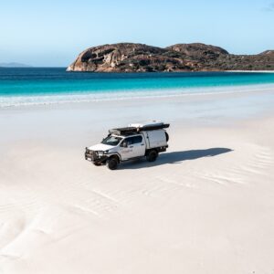 Australia Tours – RedSands Campers _ 5 Person 4WD Rooftop Camper – Jake Wilton_RedSands Campers – Camper driving on beach